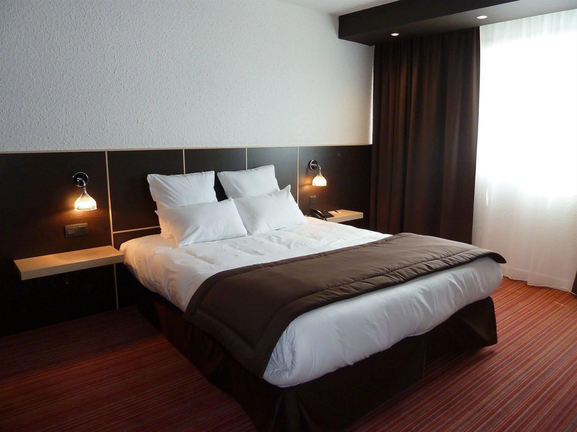 Zenitude Hotel Grenoble Alpexpo Экстерьер фото